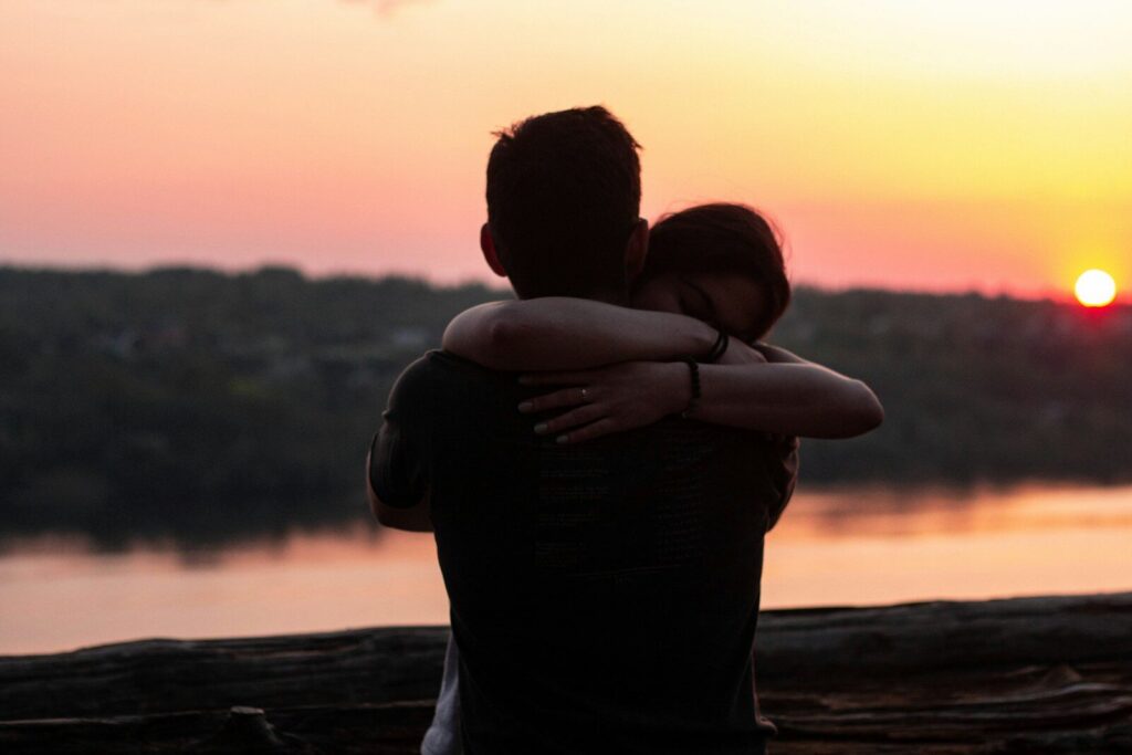 couple connecting each other during sunset